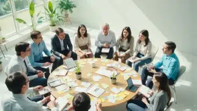 Donne e uomini seduti in cerchio in una luminosa e moderna sala riunioni